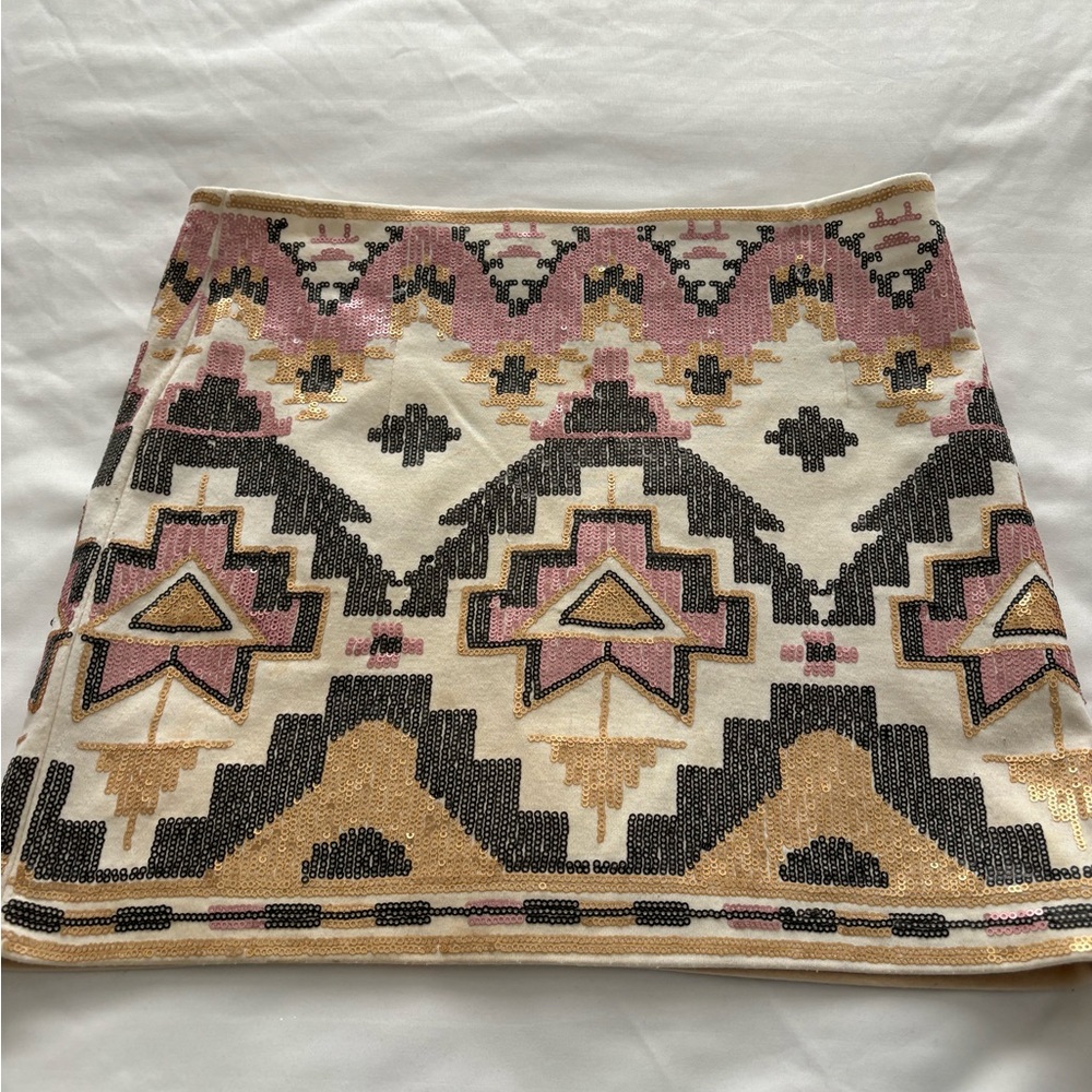 Pink gold and black sequin skirt.